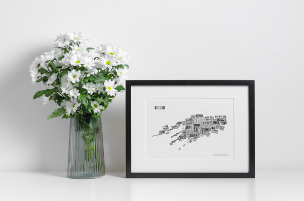 West Cork placename map in black ink, designed by Anne Harrington Rees, framed, on a shelf